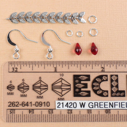 KIT Vine earrings with Swarovski crystal drops, dark red color, leaf motif, designer Irina Miech
