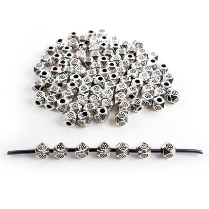 100 pcs small faceted cube beads, silver plated base metal, stamped daisy design, 4mm