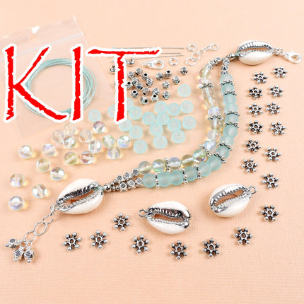 KIT Two strand ocean inspired bracelet, cowrie shells and matte glass beads, antiqued silver tone, adjustable clasp, designer Irina Miech