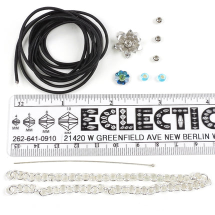 KIT leather and chain braided bracelet with blue Swarovski crystal flower clasp, black leather, silvertone, designer Irina Miech