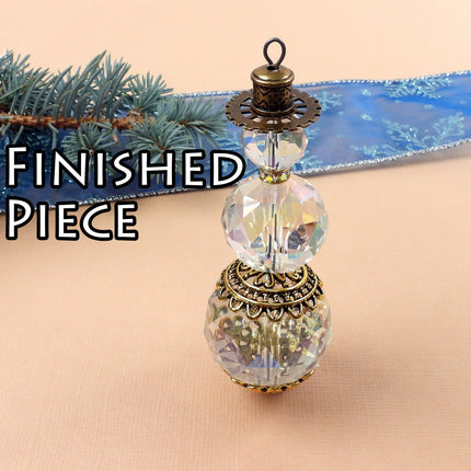 KIT Faceted glass snowman pendant, clear and silver tone, Christmas tree ornament, designer Irina Miech
